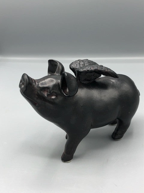 Wood pig with wing statue