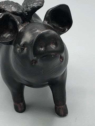 Wood pig with wing statue