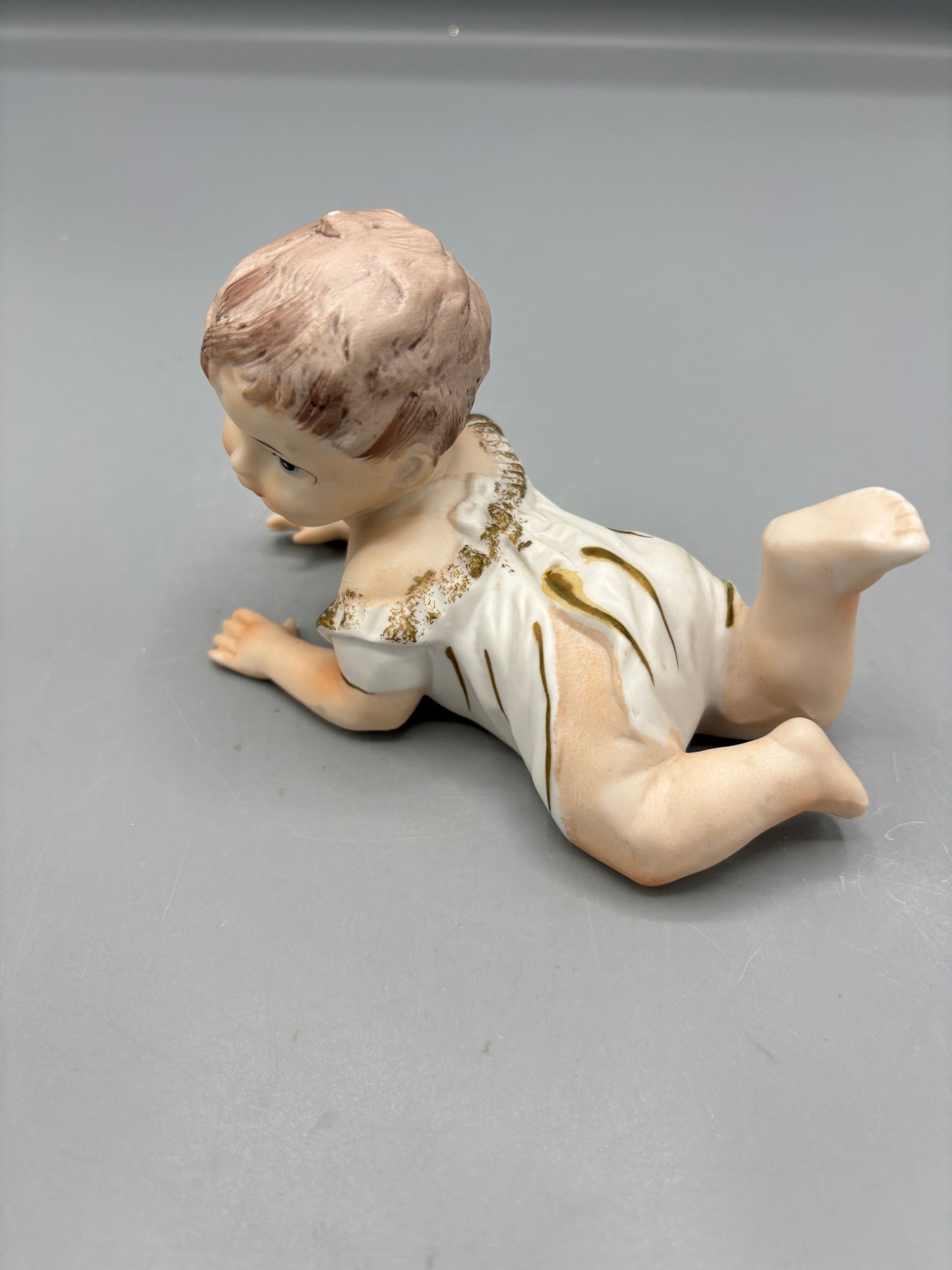 Rare  Vintage Porcelain baby laying down