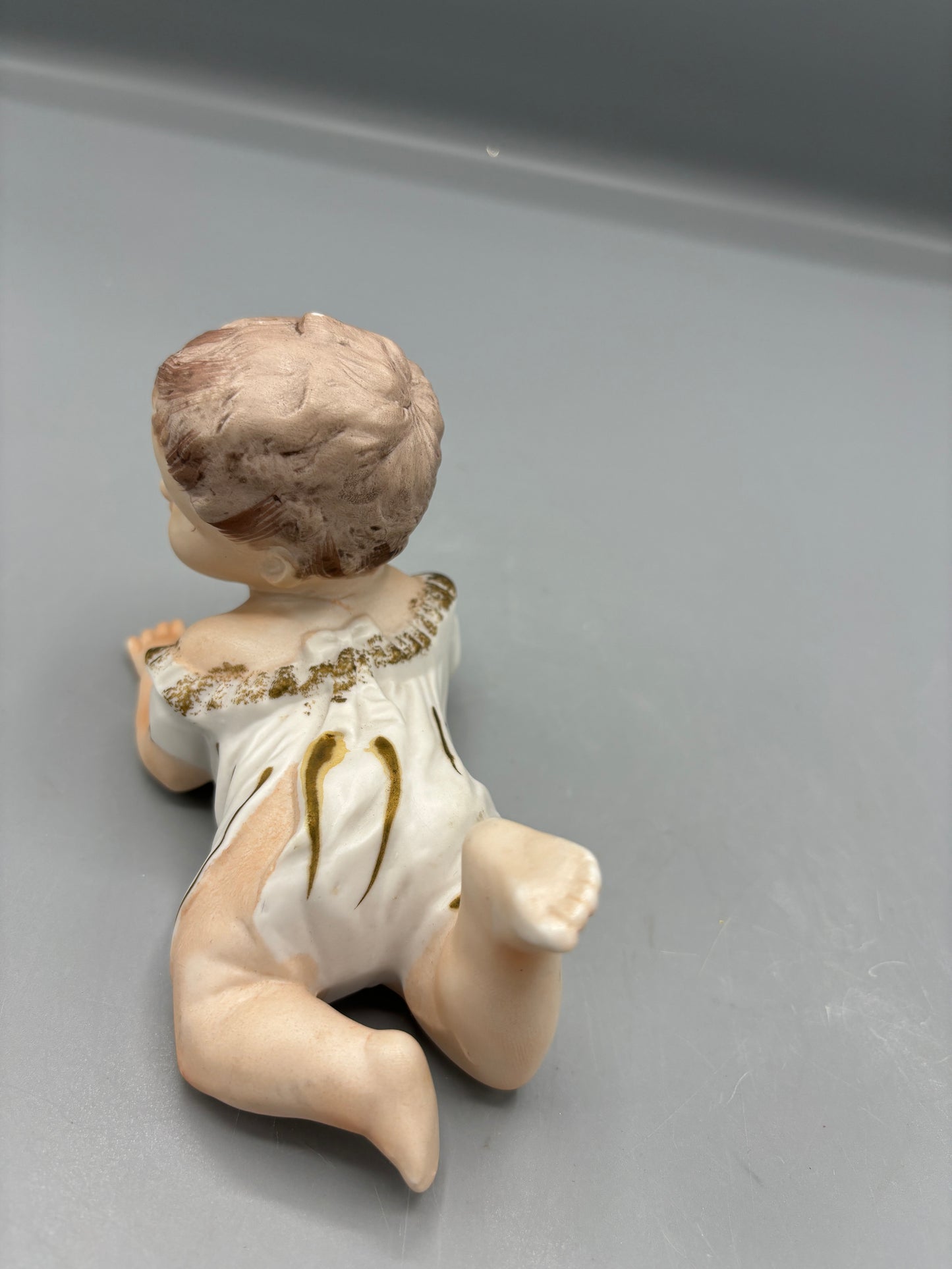 Rare  Vintage Porcelain baby laying down