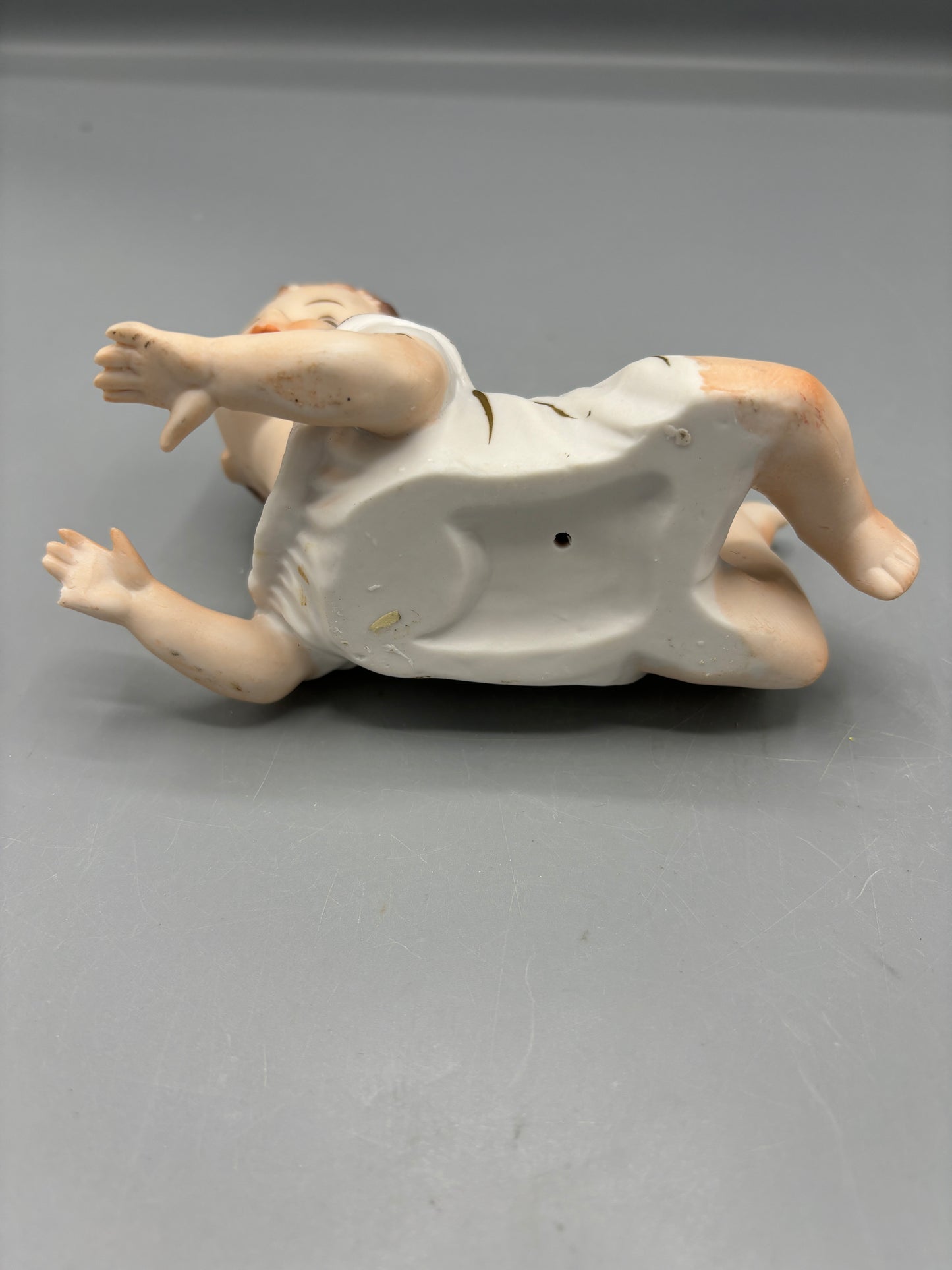 Rare  Vintage Porcelain baby laying down