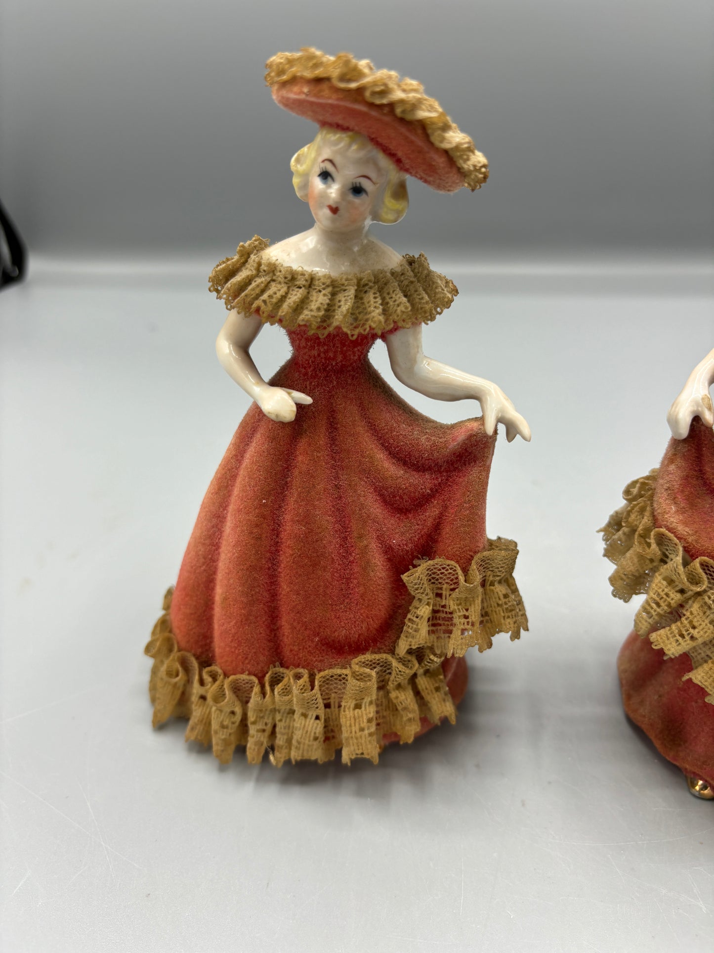 Vintage porcelain pair of ladies in Velvet dress