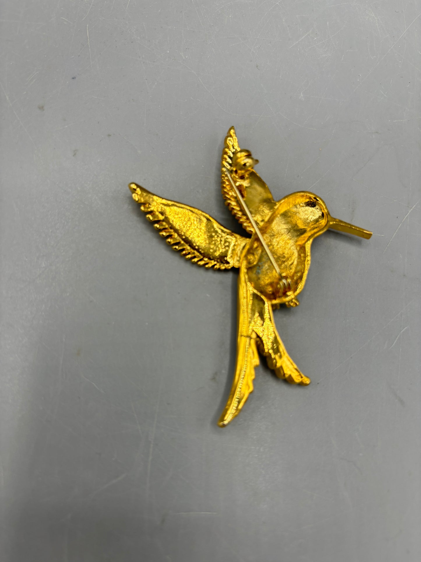 Gold tone colorful enamel hummingbird brooch