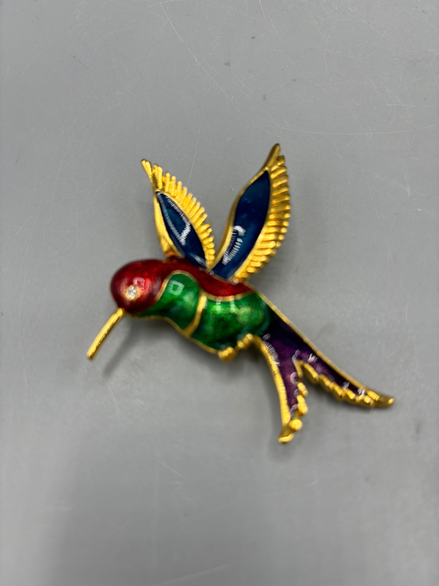 Gold tone colorful enamel hummingbird brooch