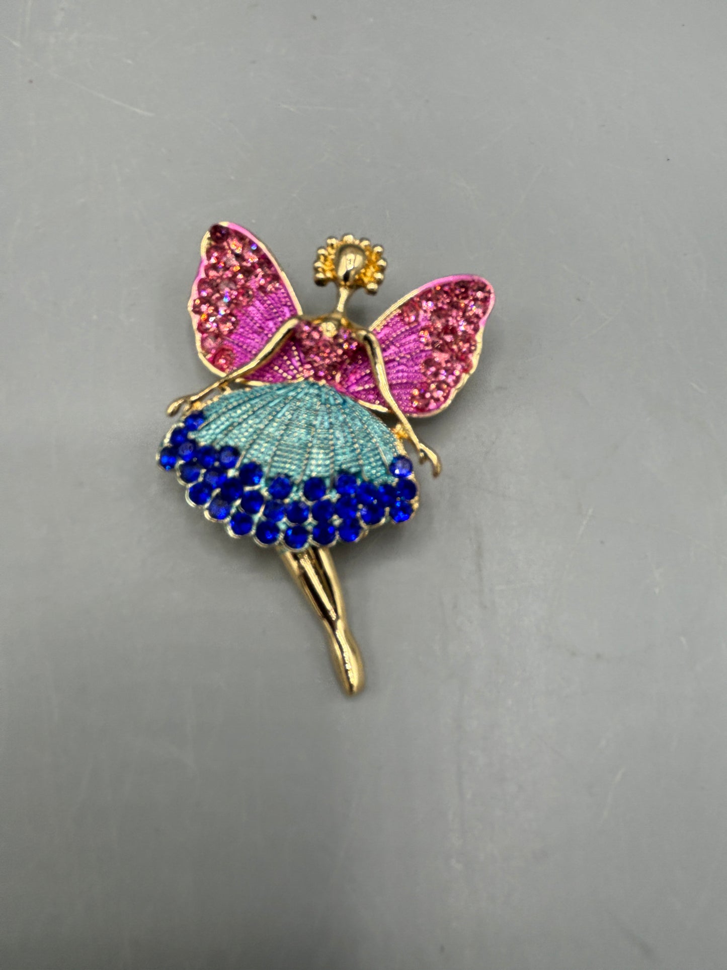 Gold tone magic fairy brooch