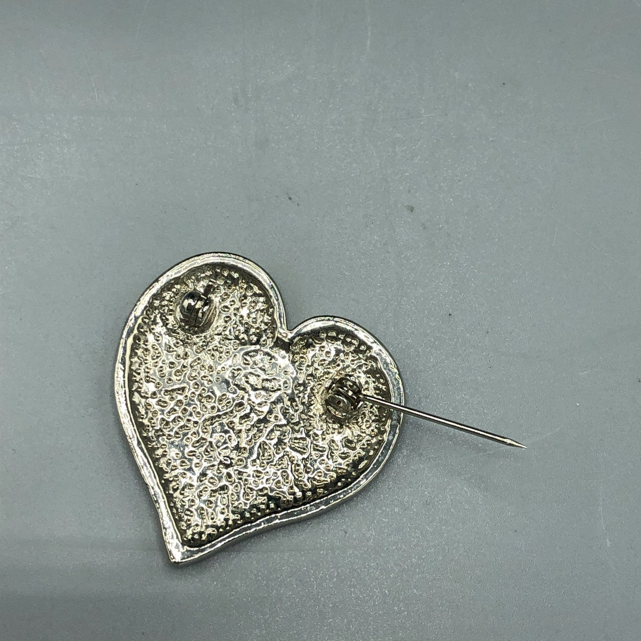 Silver tone & black enamel heart pin