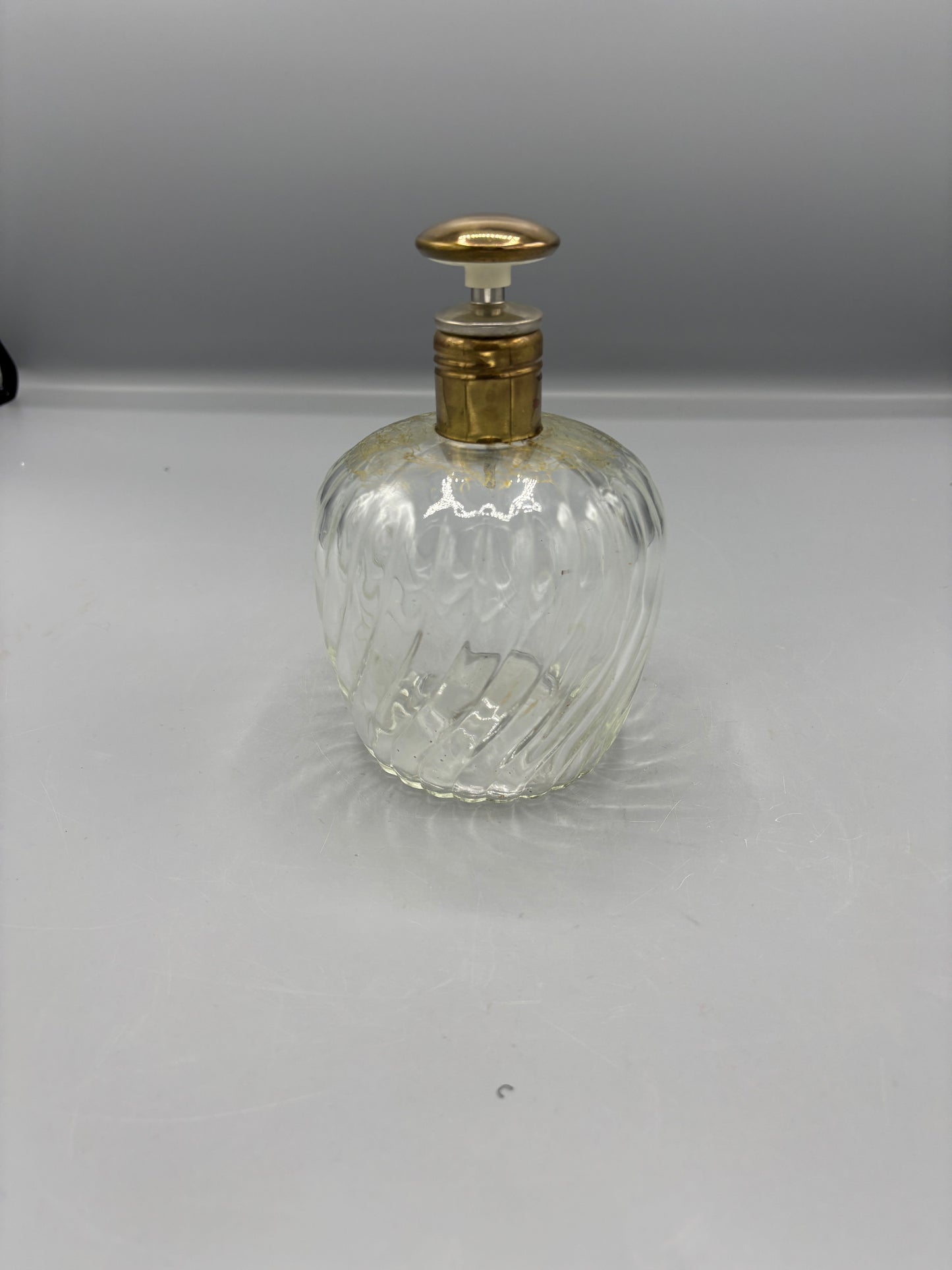 Vintage clear swirl glass decanter with gold stopper