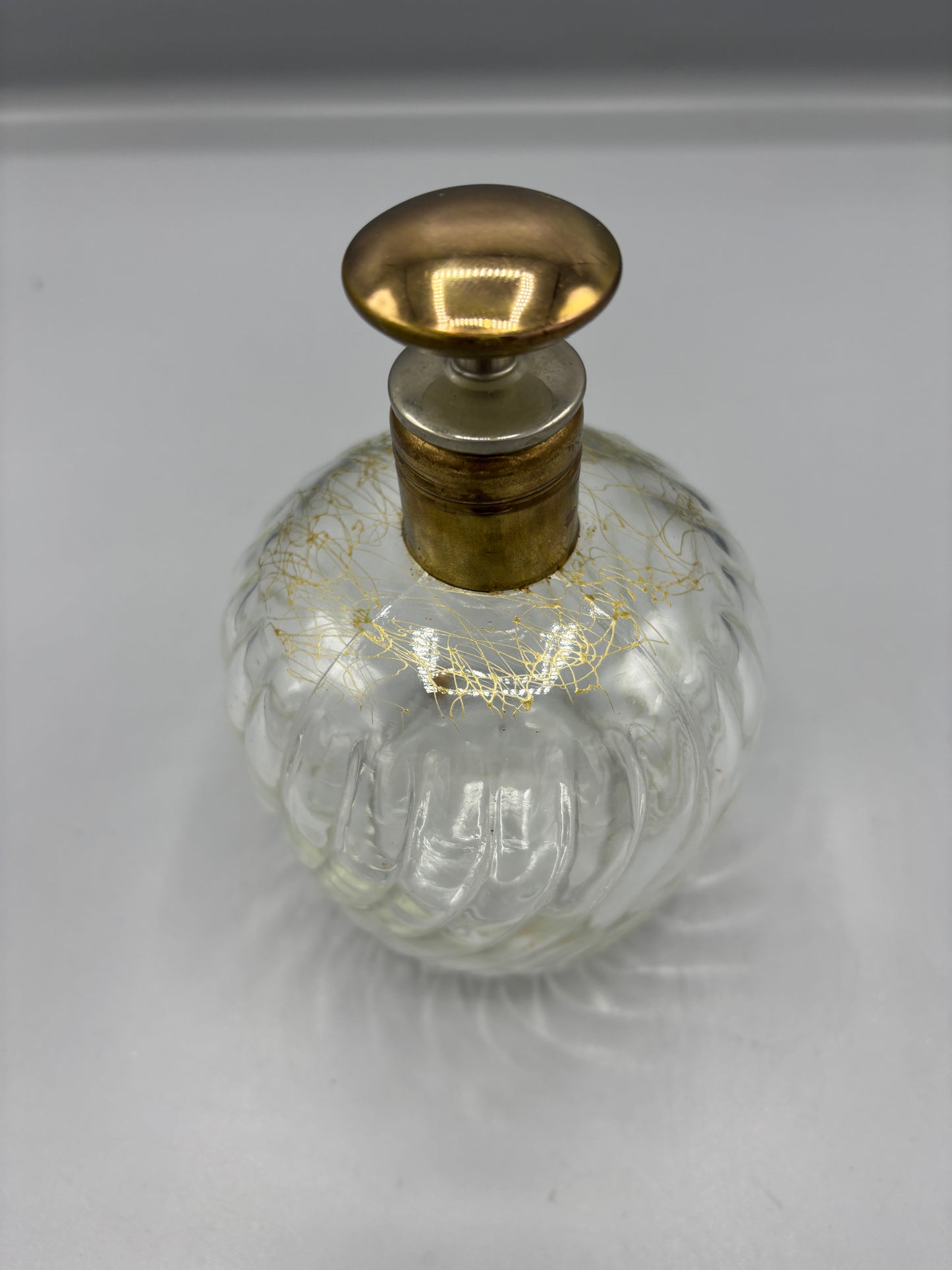 Vintage clear swirl glass decanter with gold stopper