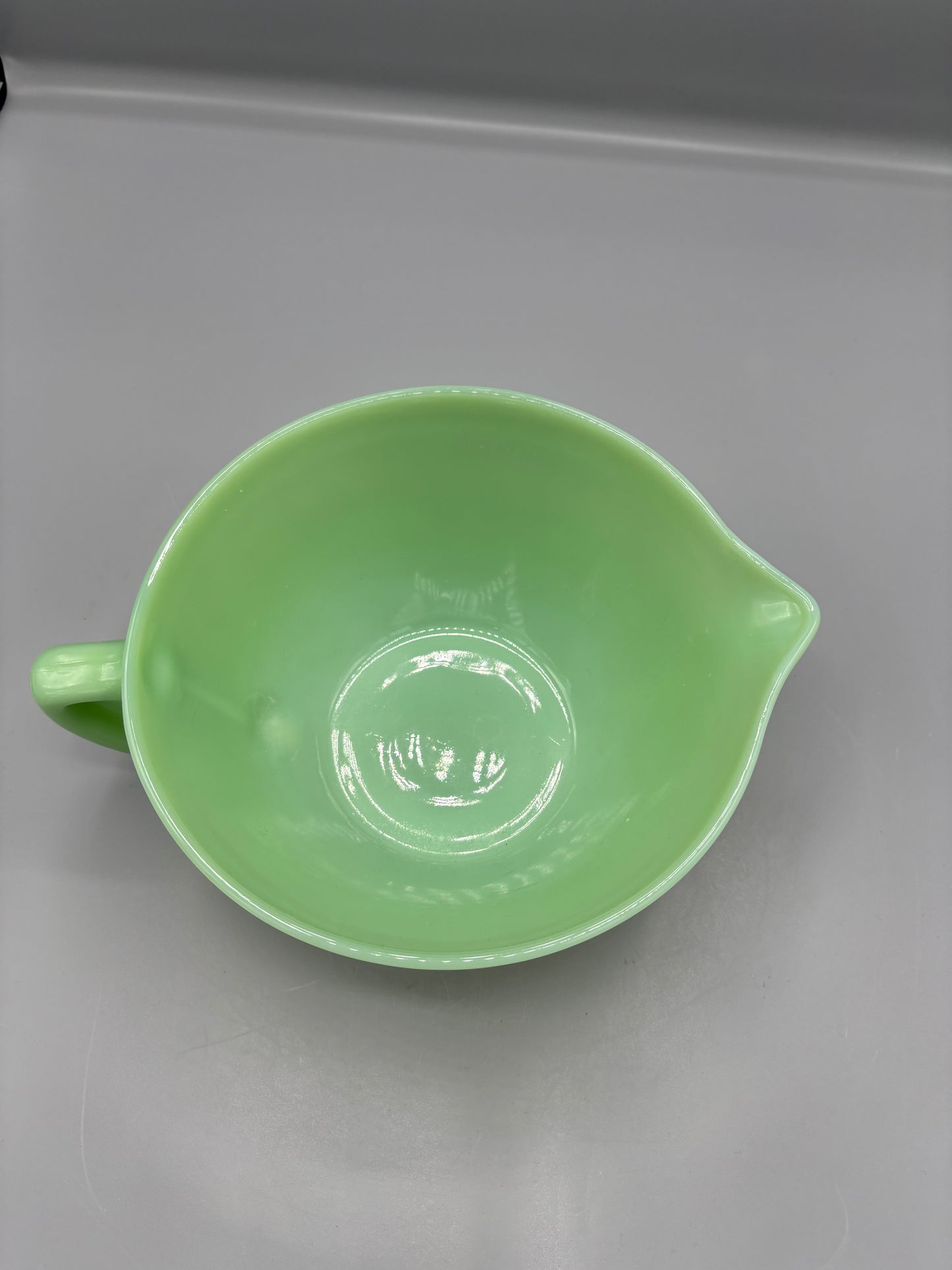 Vintage Fire King Jadeite mixing bowl with handle