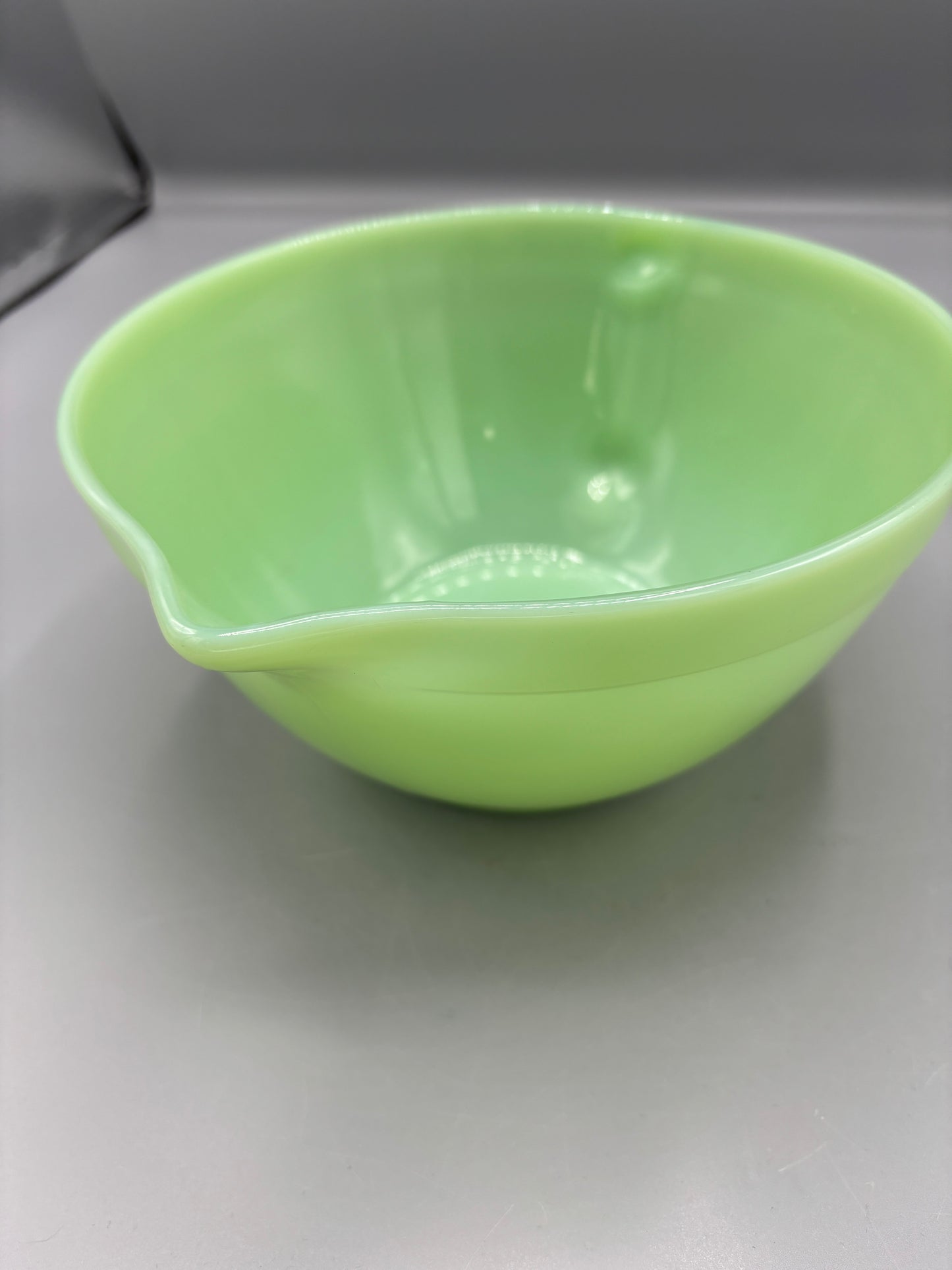 Vintage Fire King Jadeite mixing bowl with handle