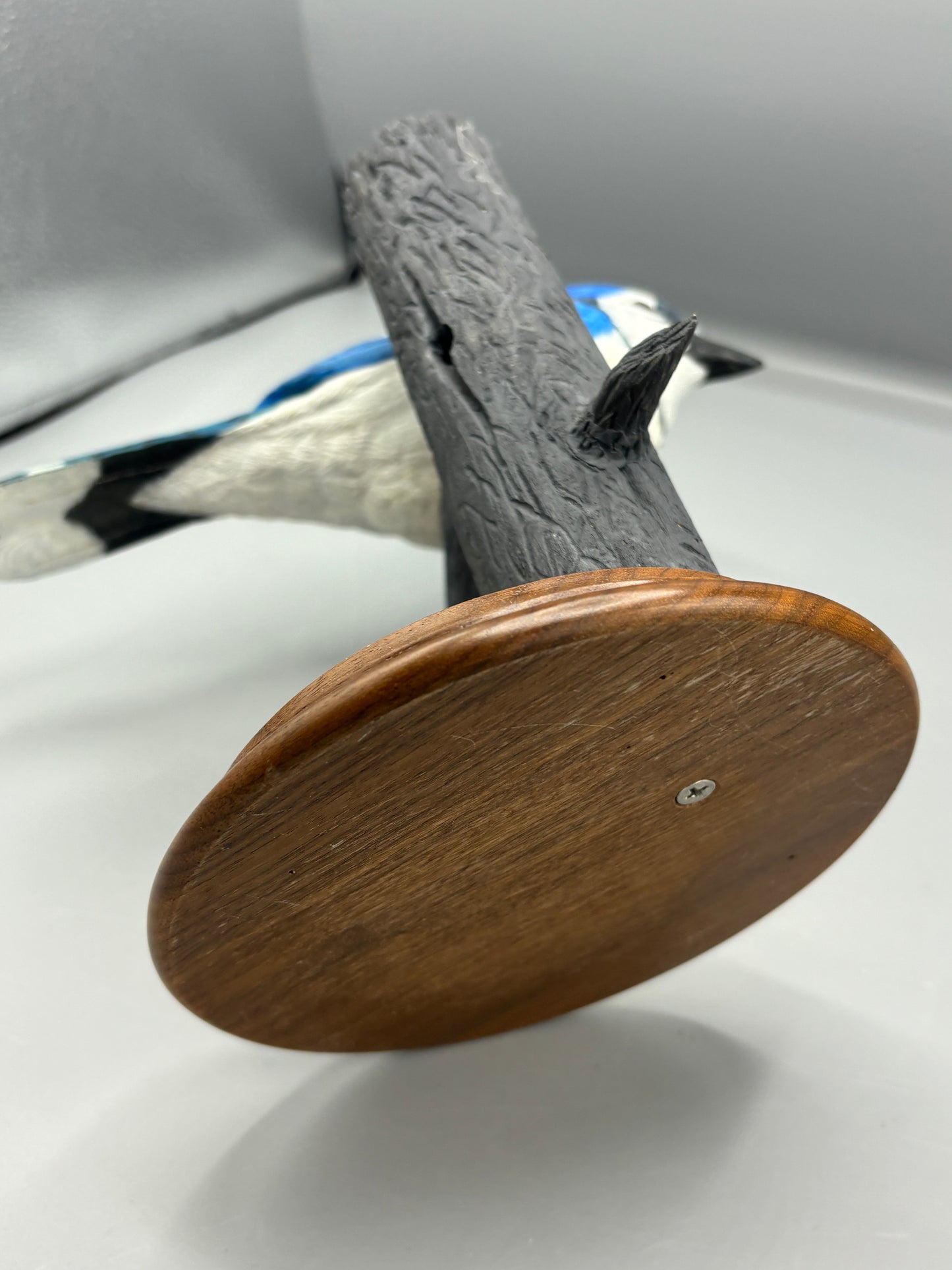 Wooden hand carved Blue Jay on branch