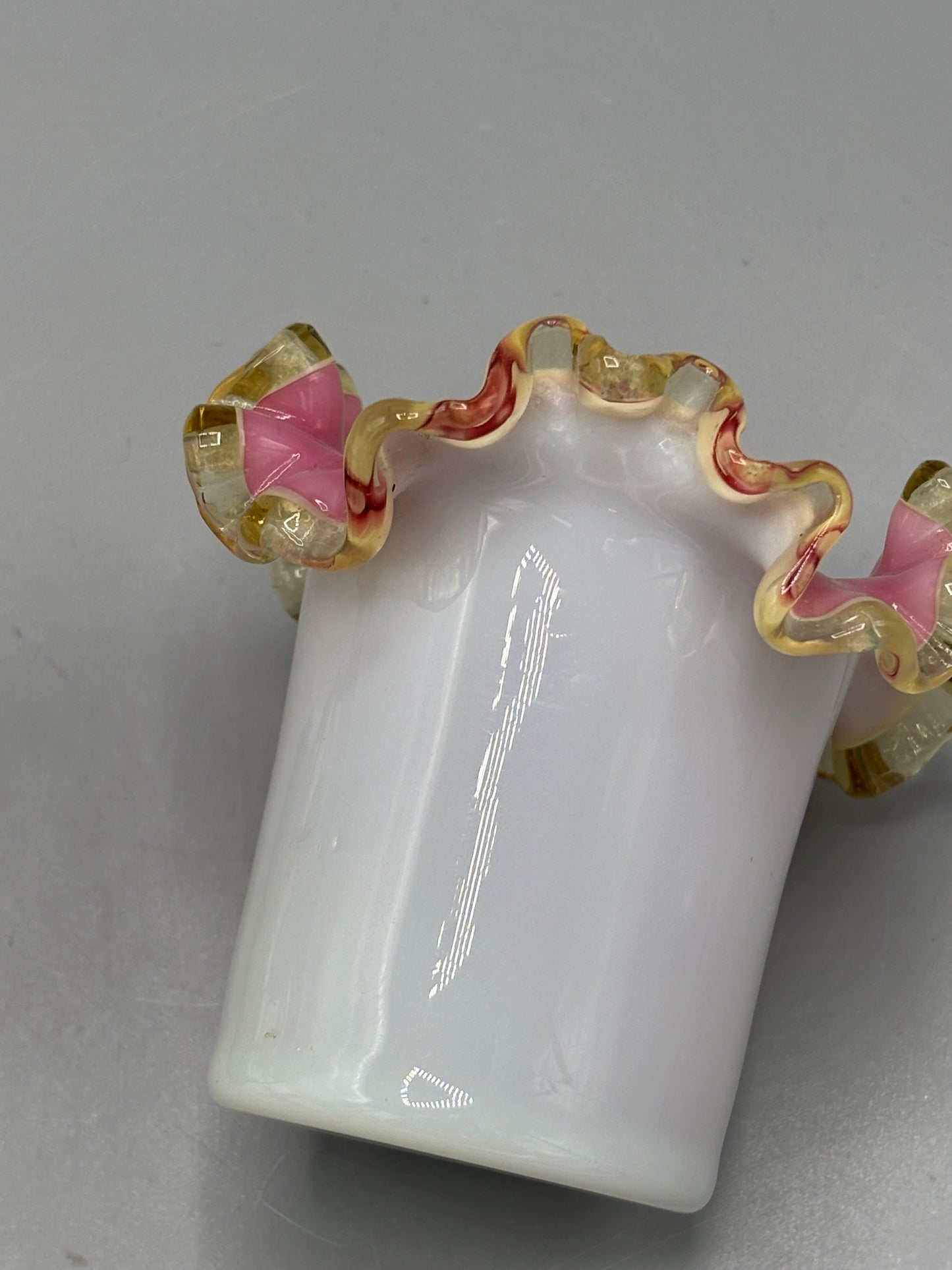 Vintage Fenton Amber Crest vase in metal holder