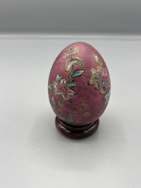 Vintage hand painted ceramic egg on wood stand