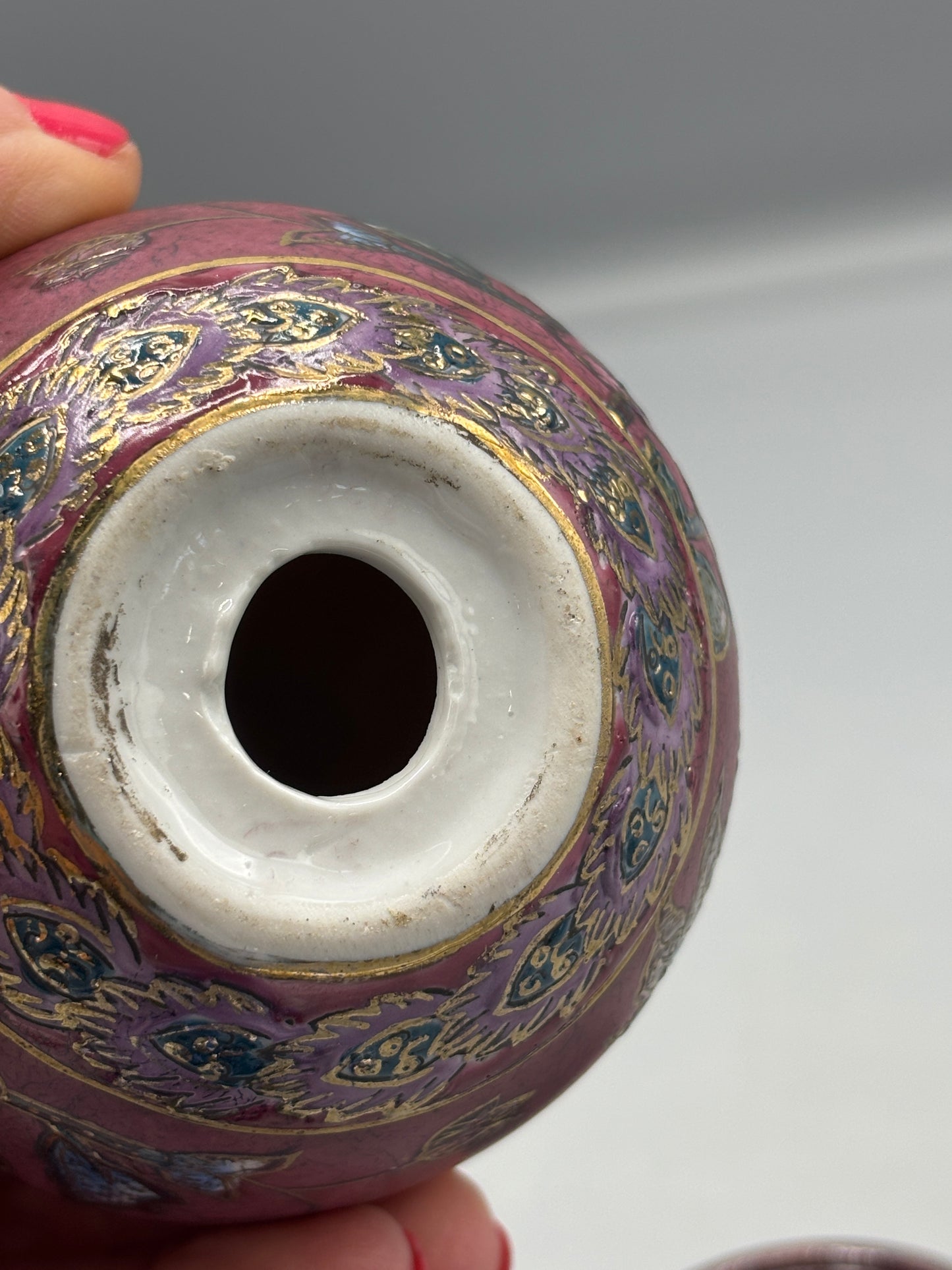 Vintage hand painted ceramic egg on wood stand