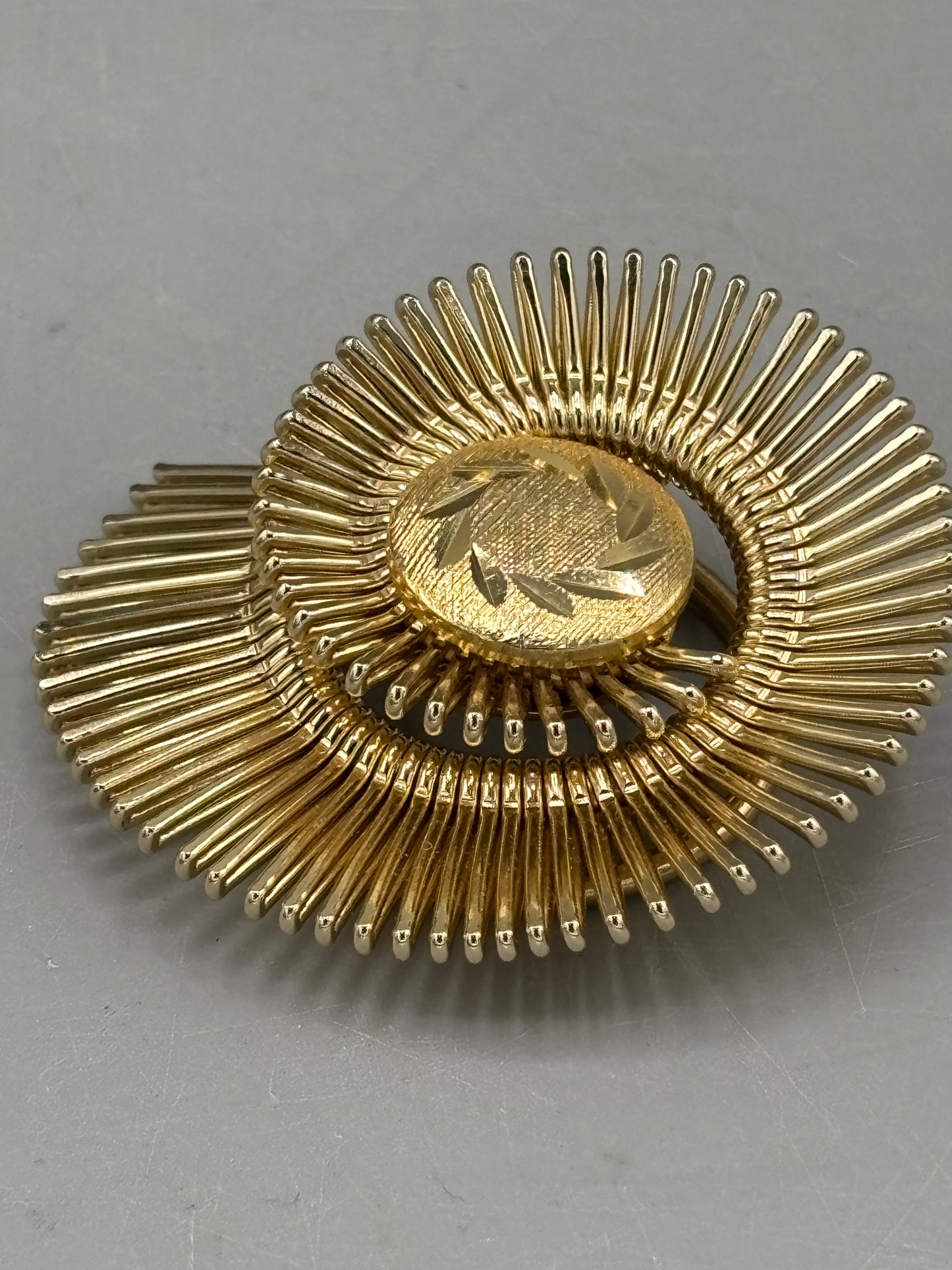 Vintage gold tone West Germany scarf clip spiral design