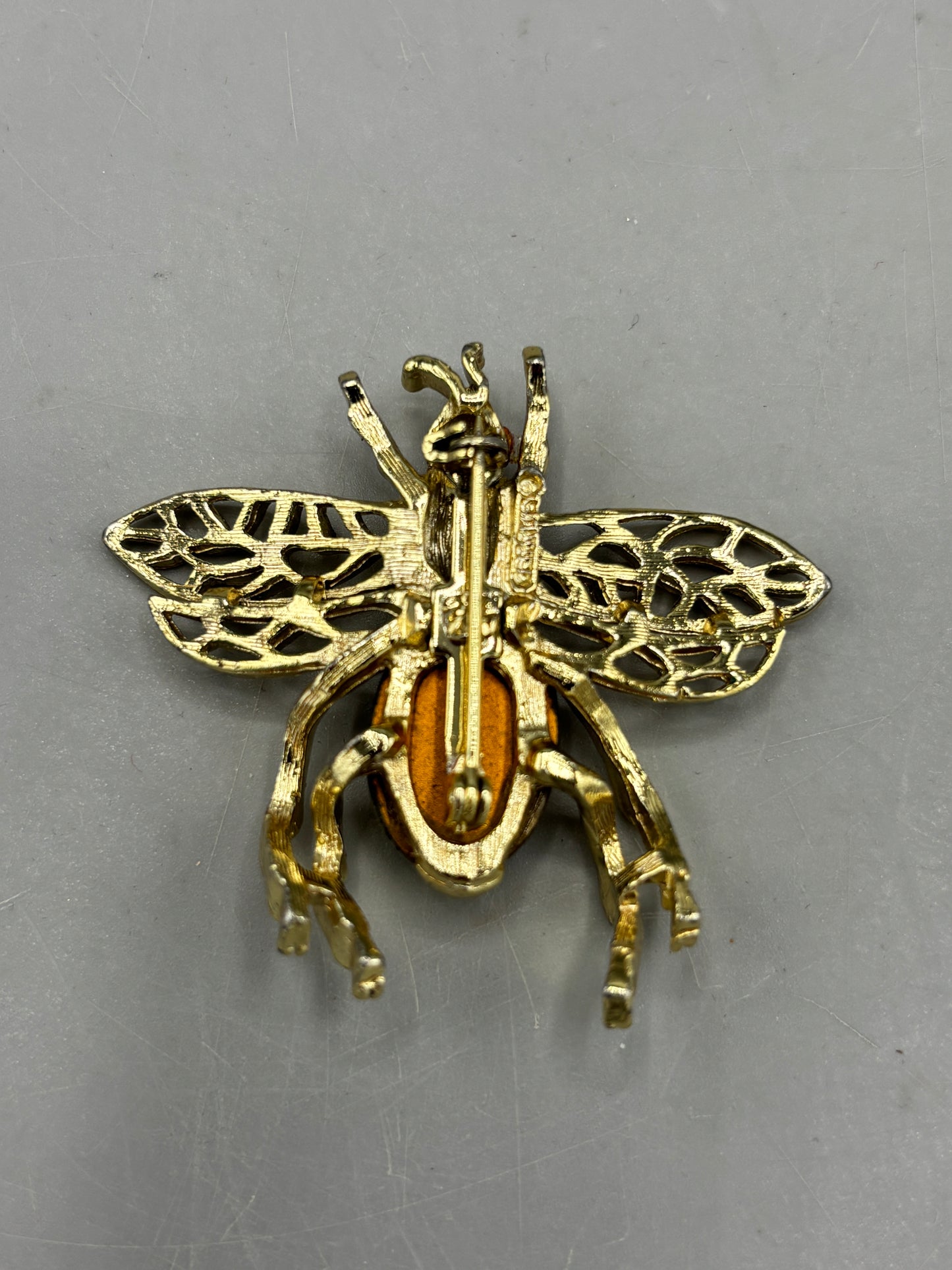 Vintage gold tone bee brooch with moonstone