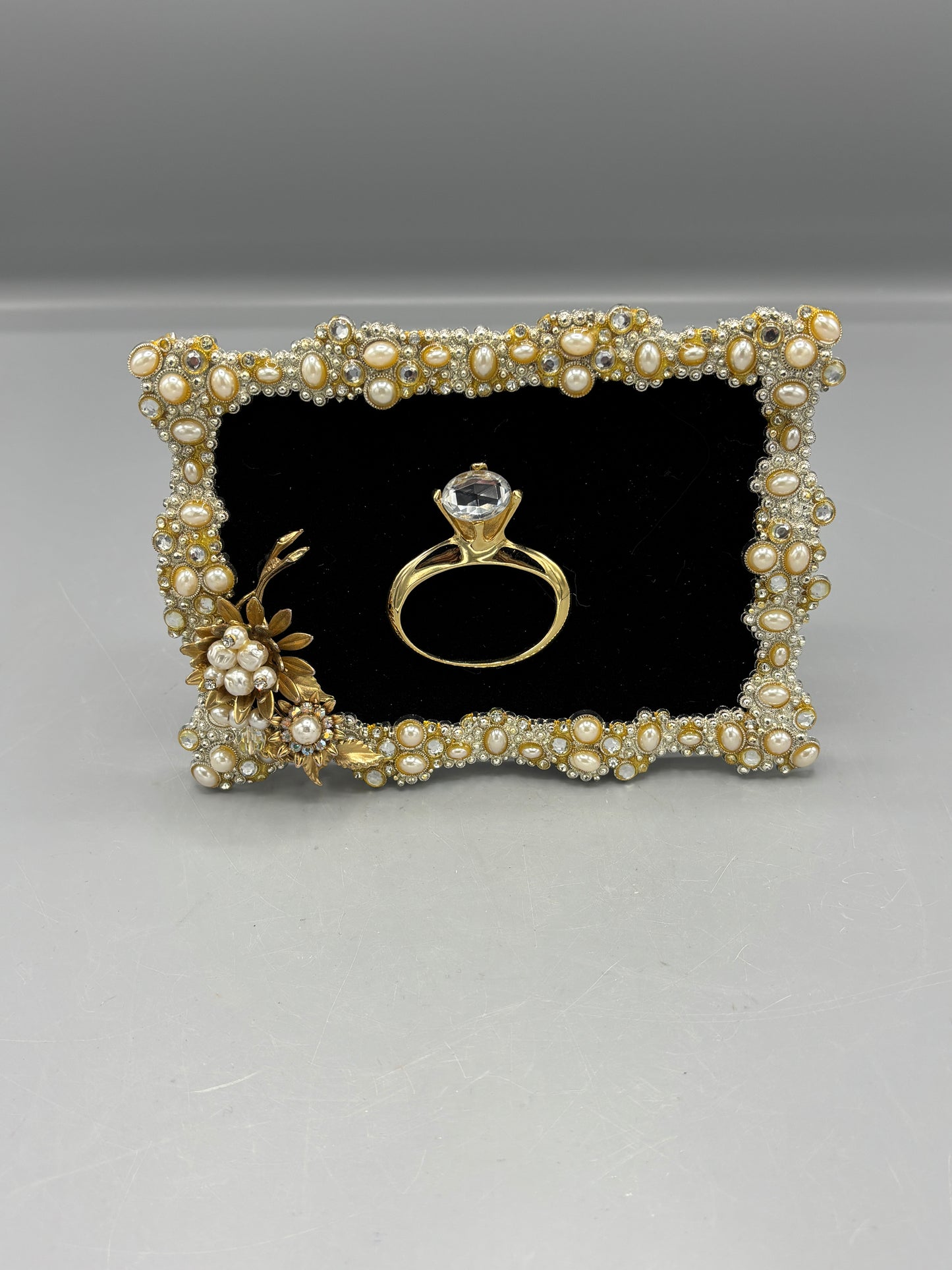 Bejeweled frame with ring