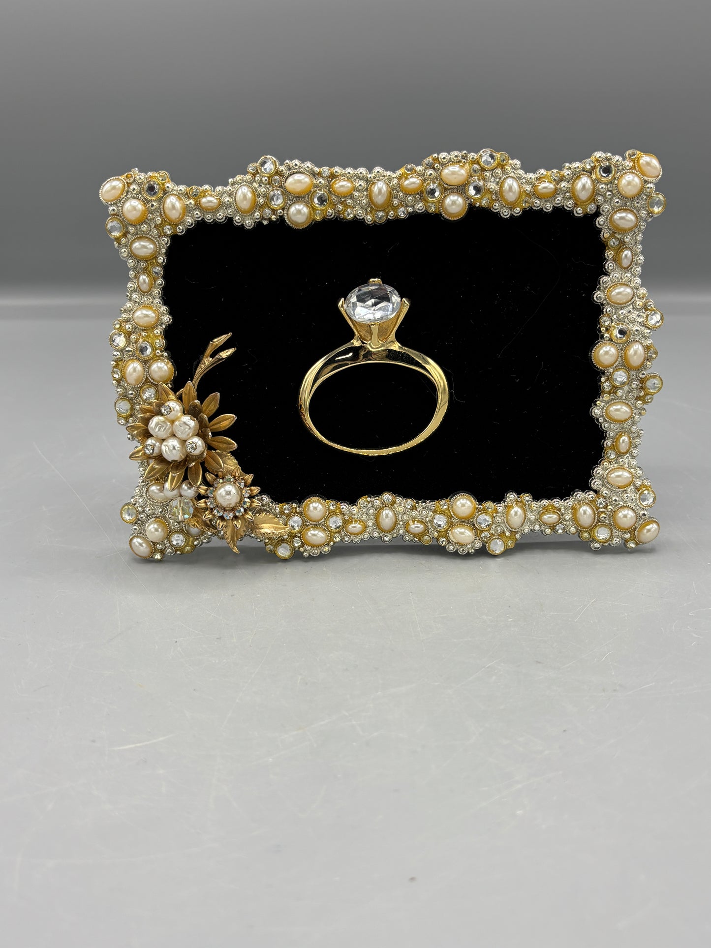 Bejeweled frame with ring