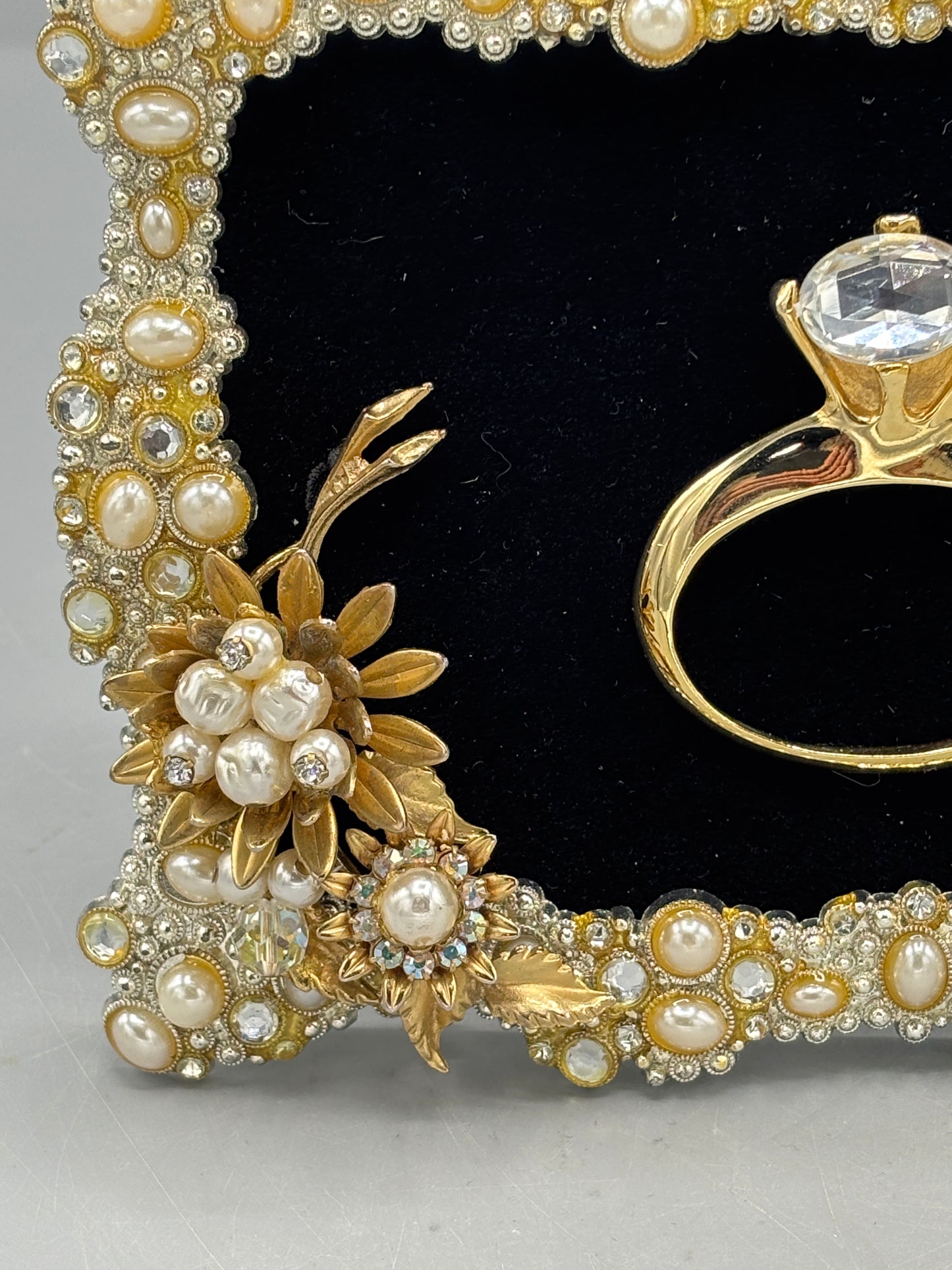 Bejeweled frame with ring