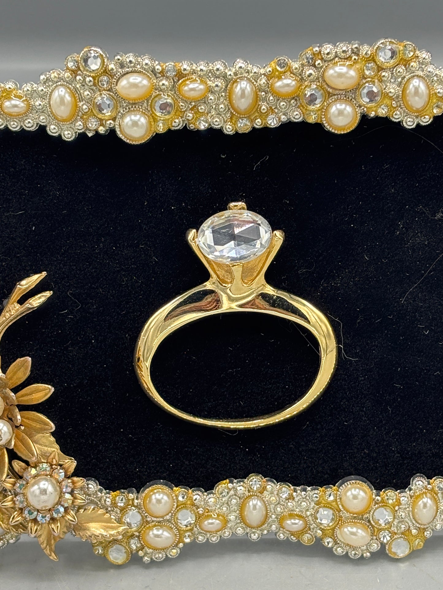 Bejeweled frame with ring