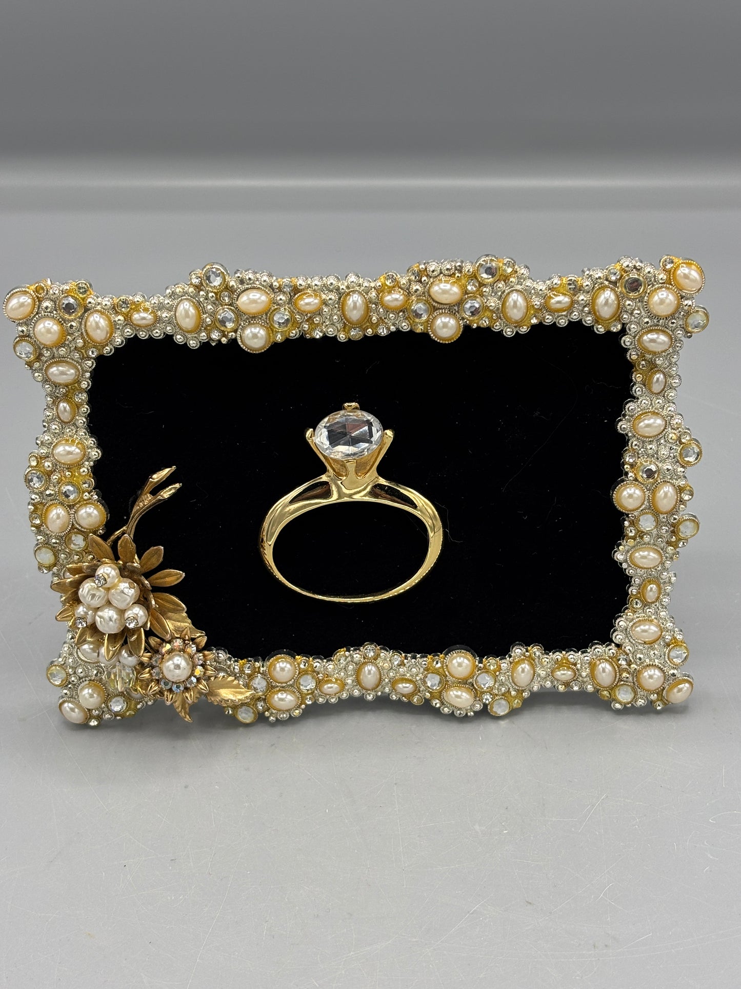 Bejeweled frame with ring