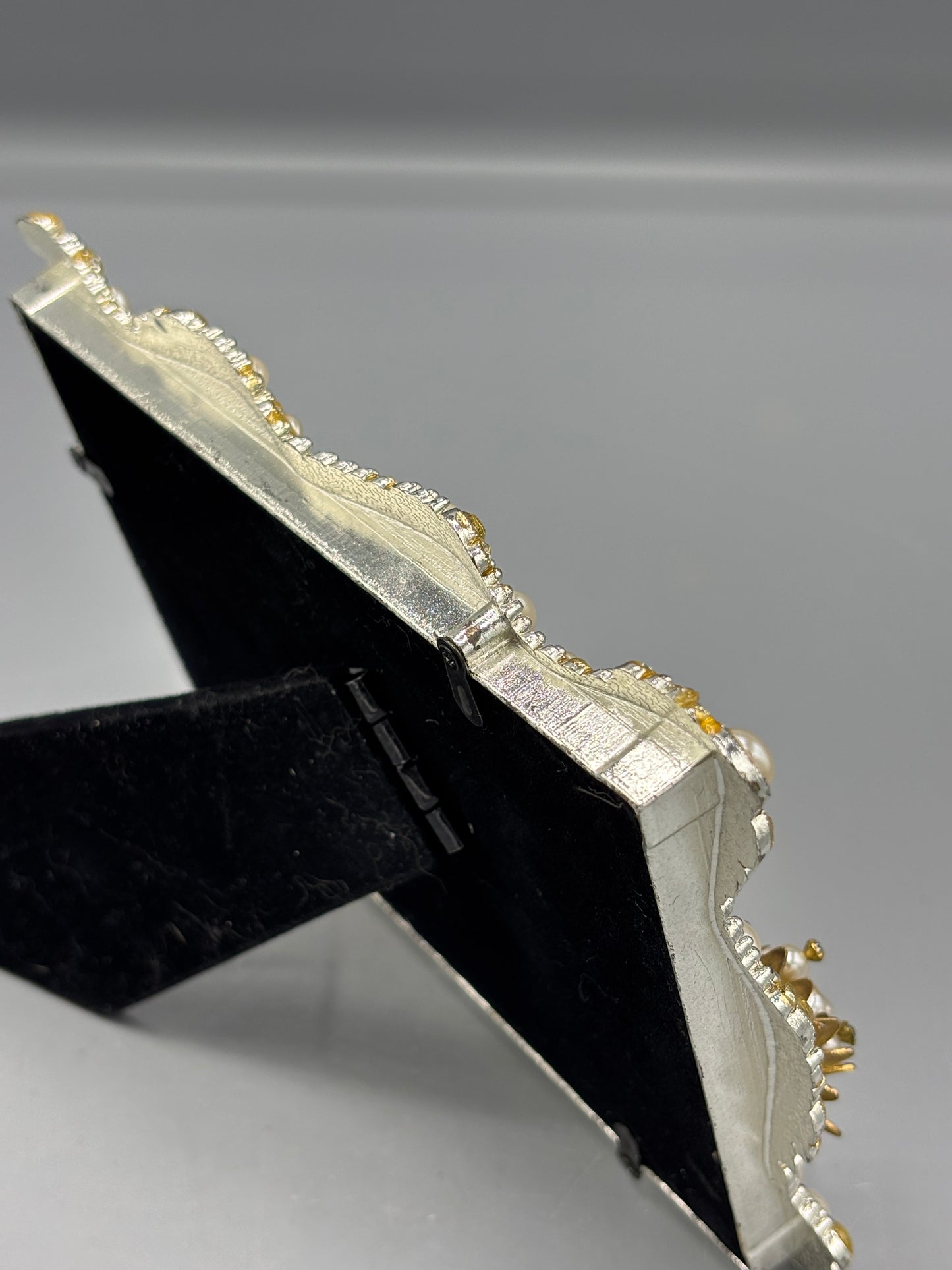 Bejeweled frame with ring