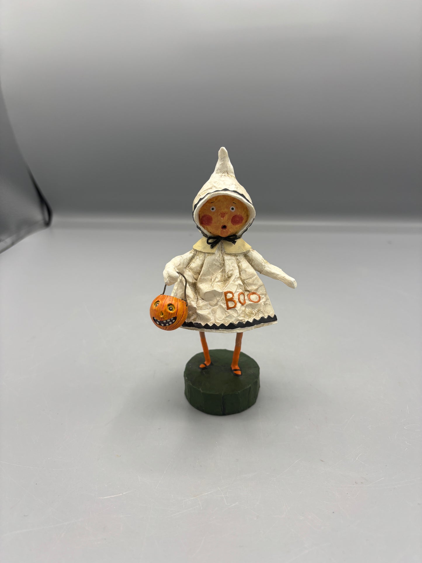 Little Boo girl figure holding pumpkin