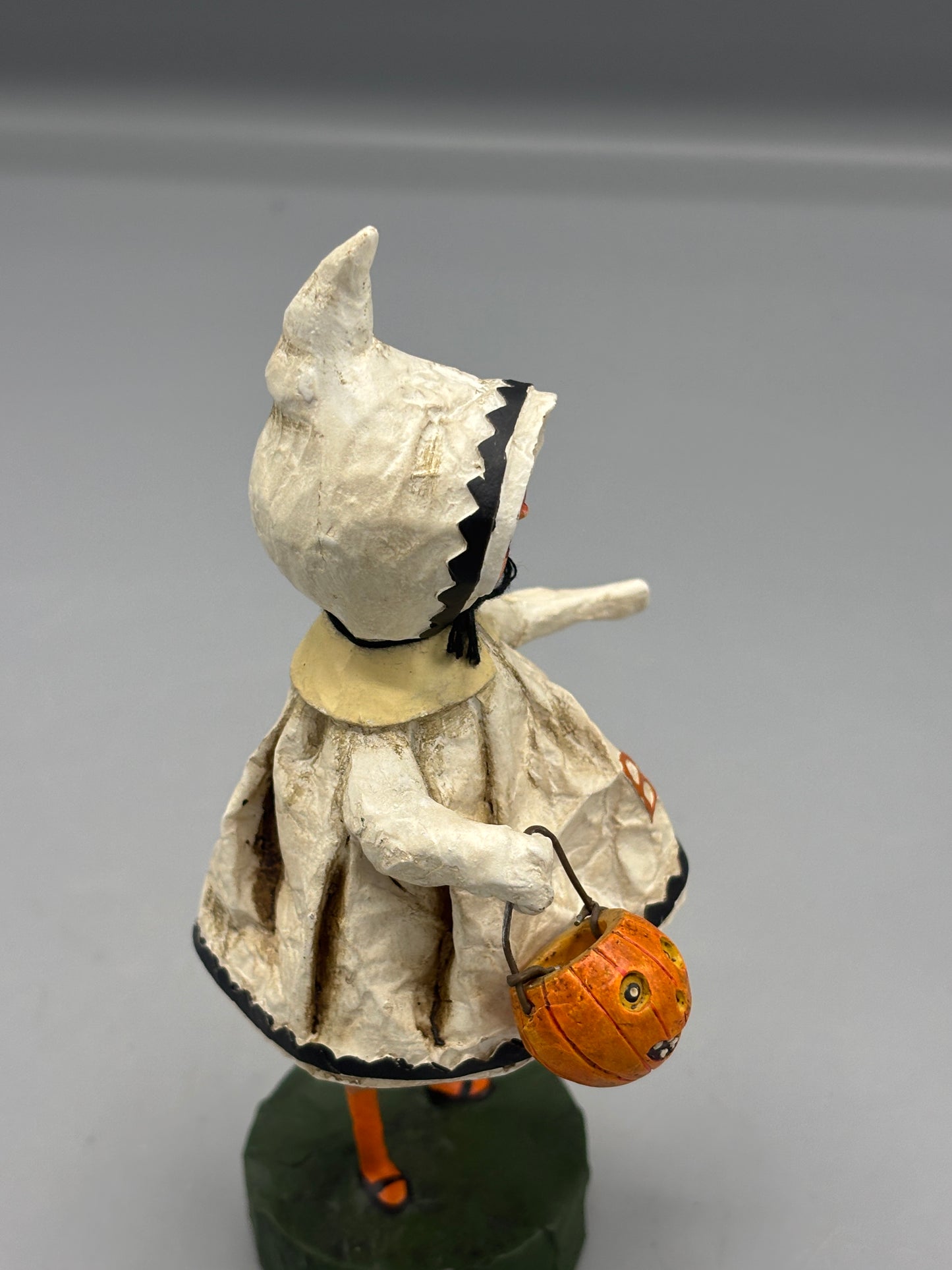 Little Boo girl figure holding pumpkin