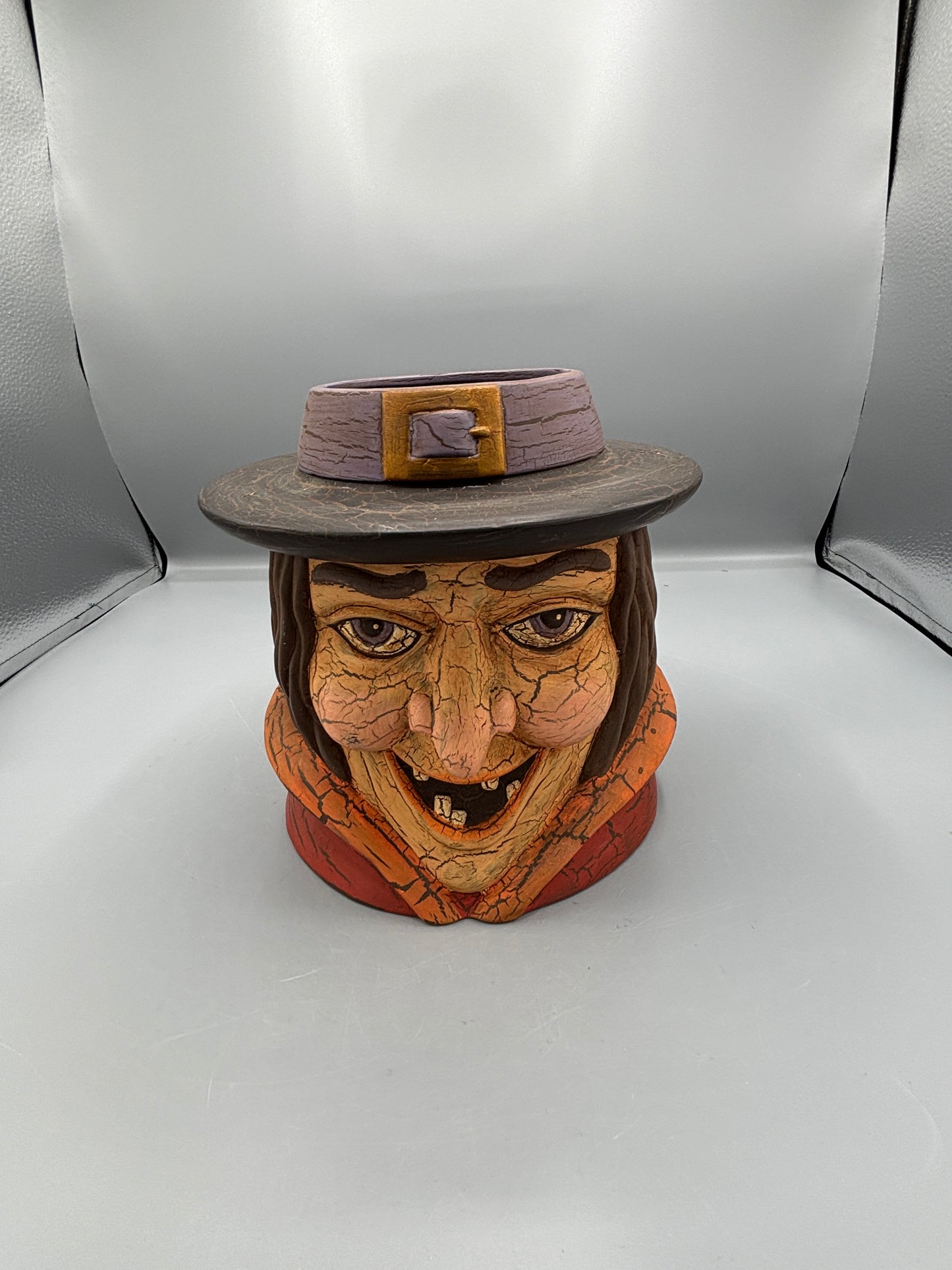 Vintage style crackle Halloween witch face