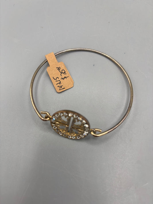 Gold tone Tory Burch style bangle