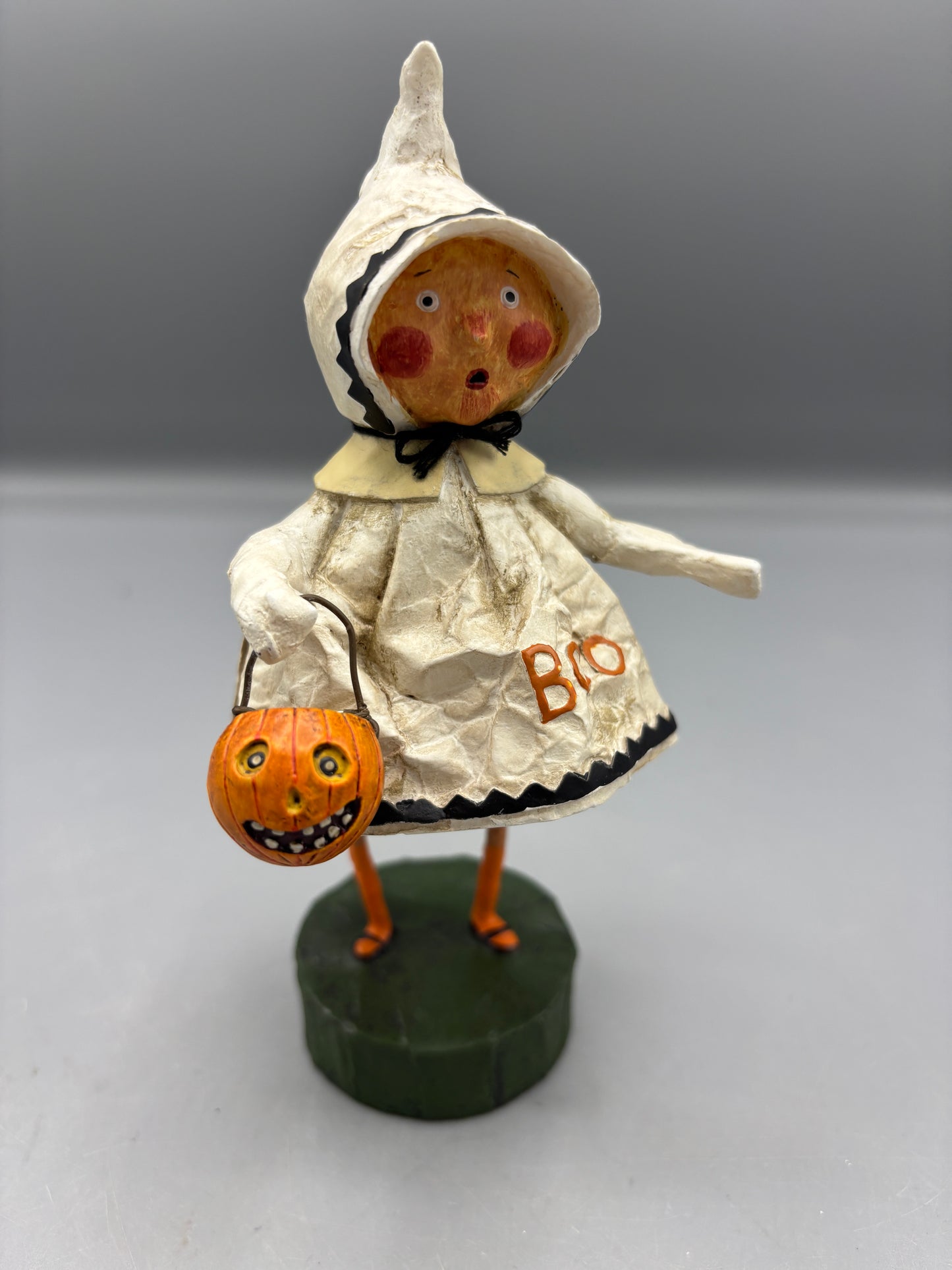 Little Boo girl figure holding pumpkin