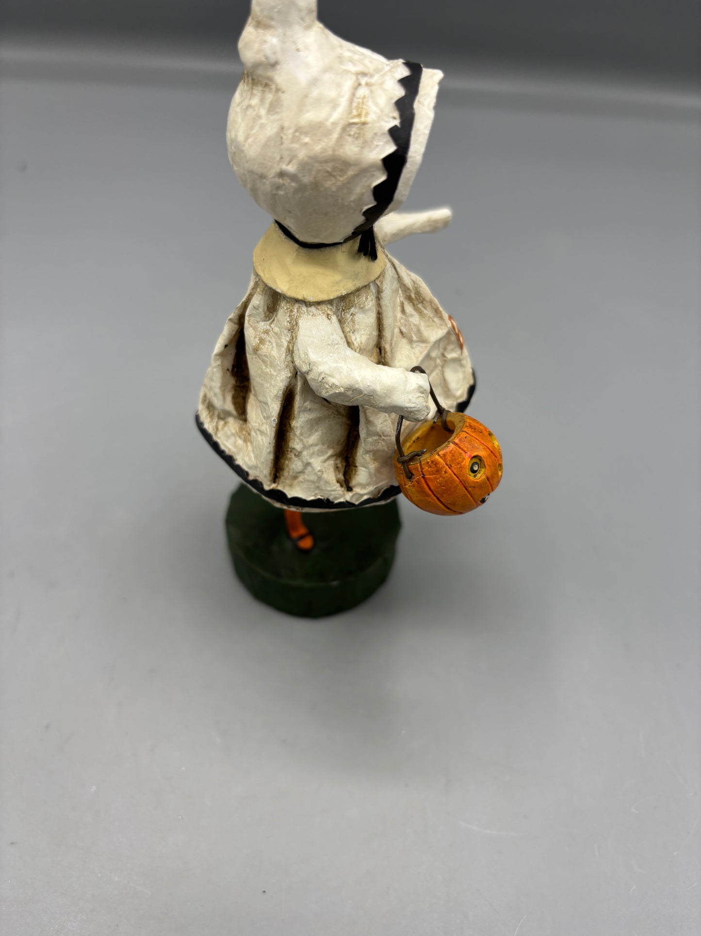 Little Boo girl figure holding pumpkin
