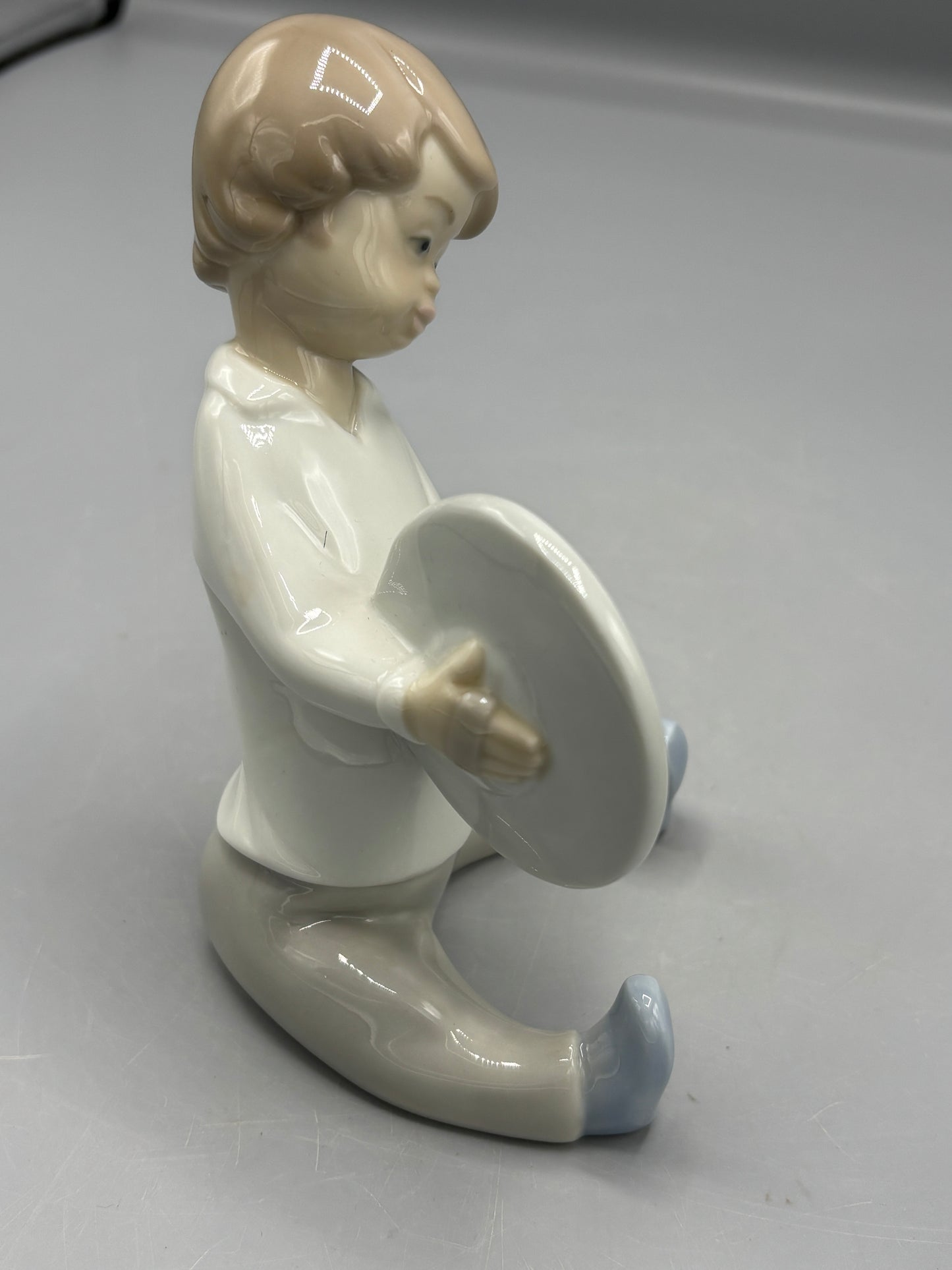 Lladro Boy playing Cymbals