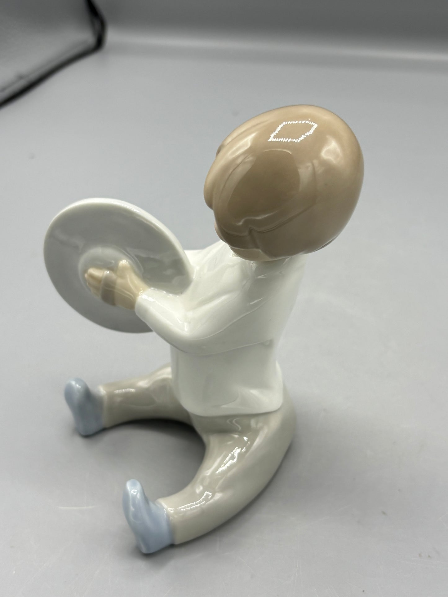 Lladro Boy playing Cymbals