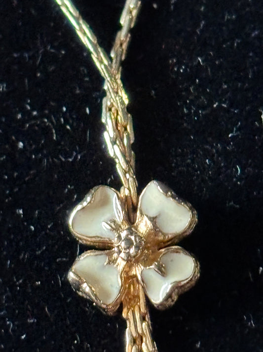 Gold enamel flower necklace