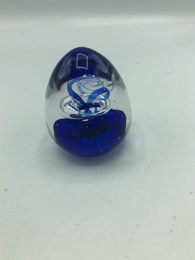Glass egg paperweight