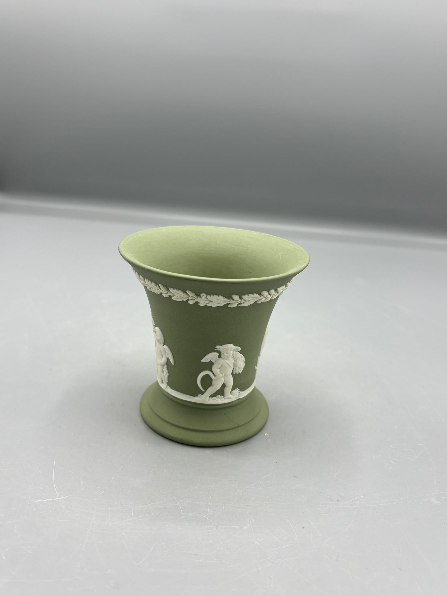 Green Jasperware Cupids Trumpet vase