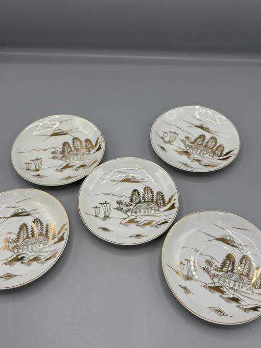 Japanese porcelain saucers with gold design