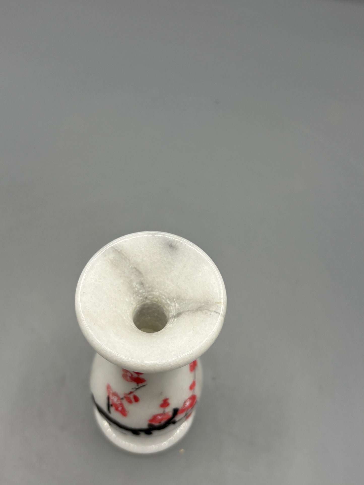 White marble vase with Cherry Blossom branch