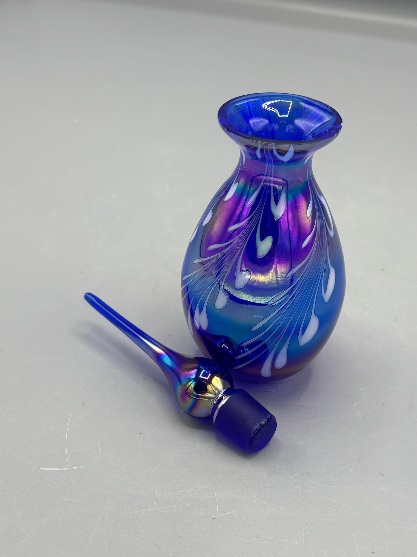 Cobalt blue iridescent bottle