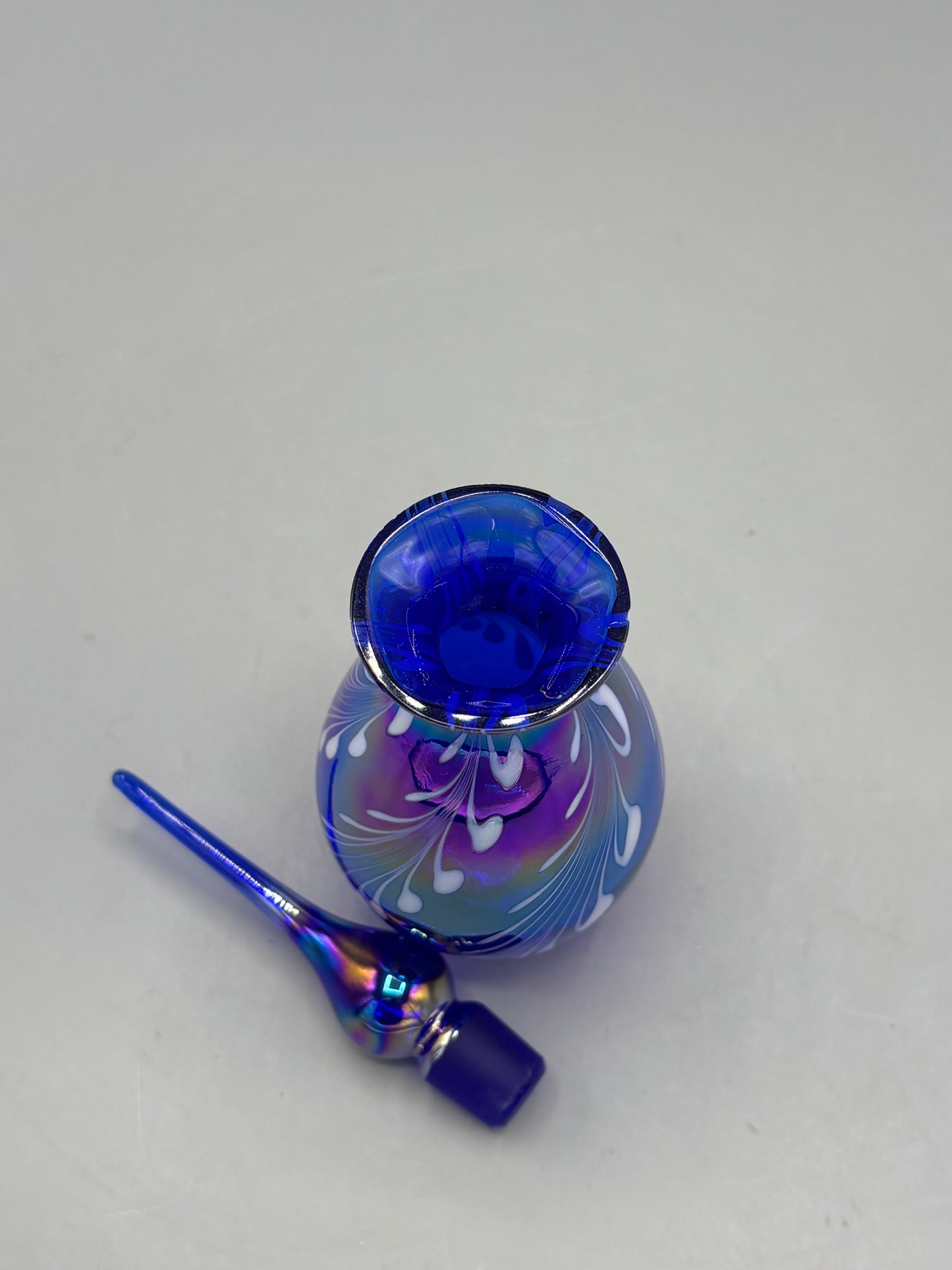 Cobalt blue iridescent bottle