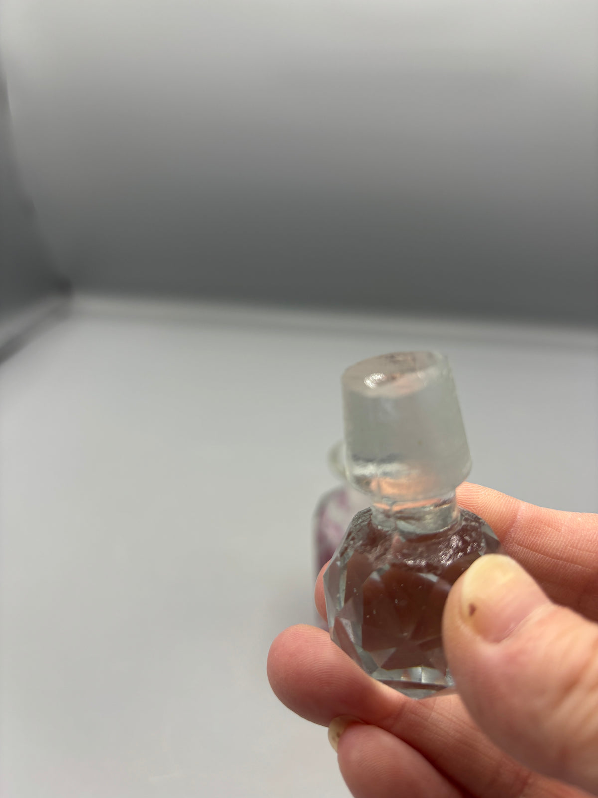 Vintage Twos Company Red glass perfume bottle