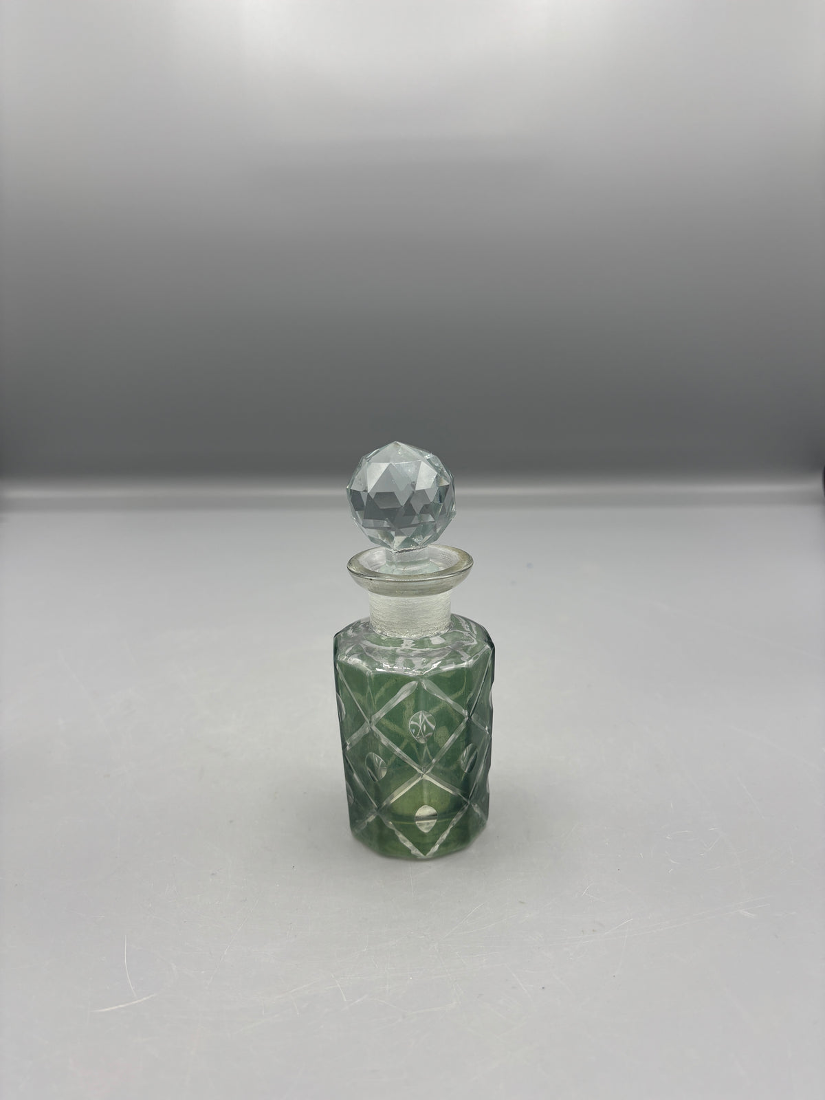 Vintage Twos Company Green glass perfume bottle
