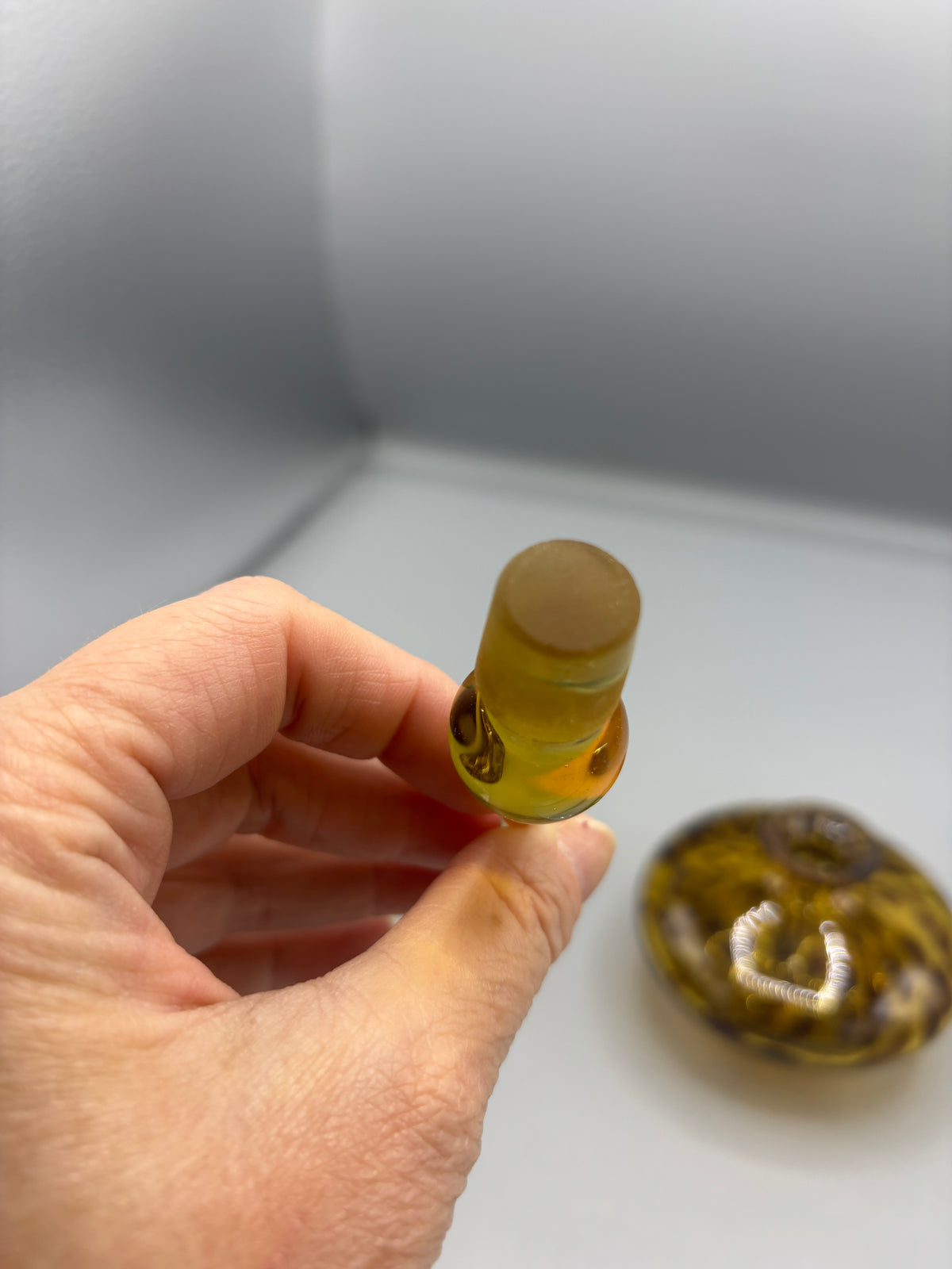 Vintage art glass Amber tortoise perfume bottle