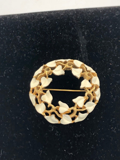 Gold tone white ivy circle brooch