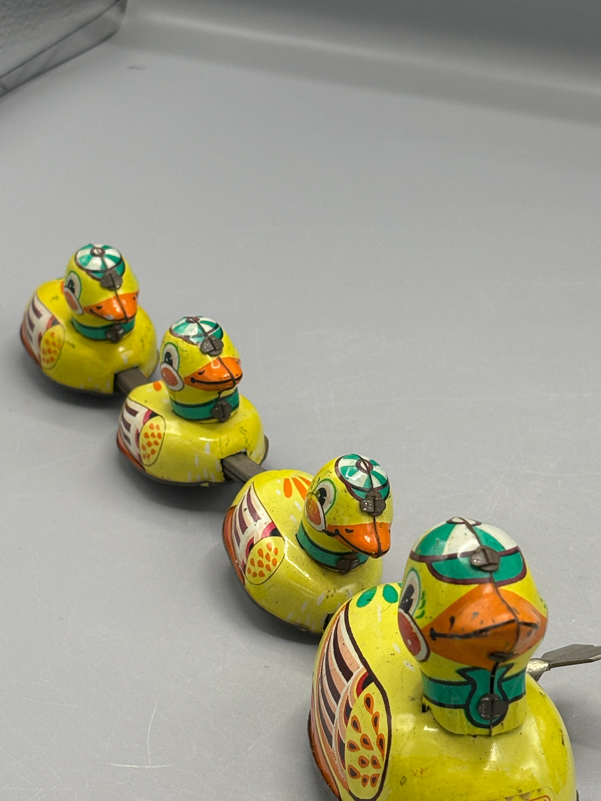 Vintage wind up tin lithograph duck family