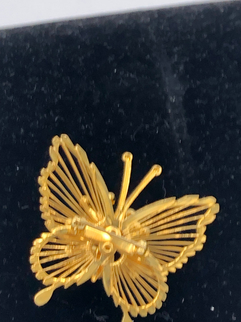 Gold tone jeweled butterfly brooch