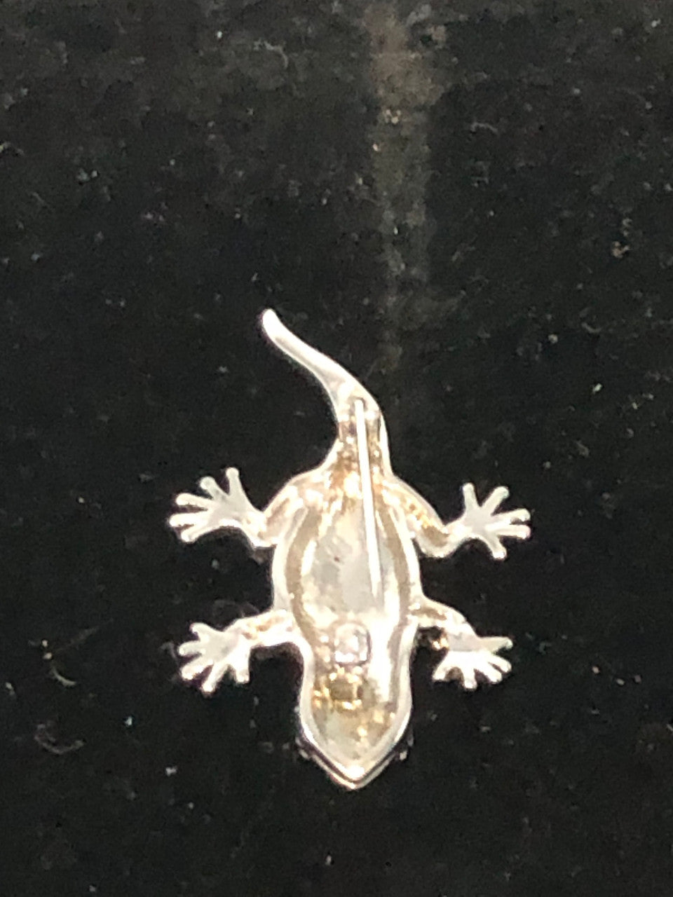 Silver tone lizard with inserted stone brooch