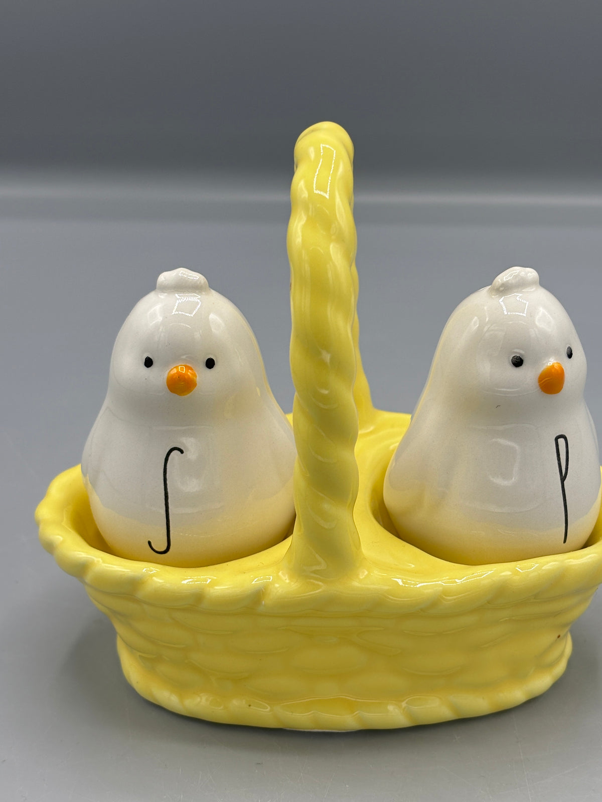 Rae Dunn ceramic chick S & P in basket
