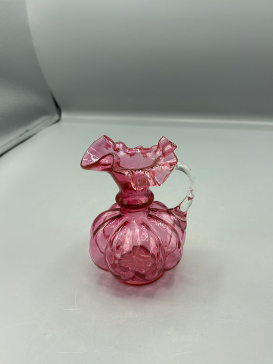 Vintage Fenton cranberry pitcher with clear handle